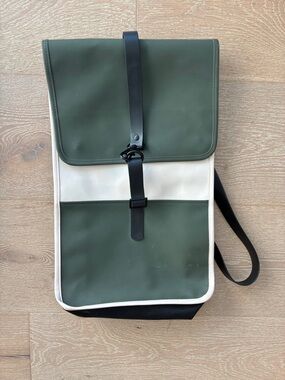 Rains waterproof Olive Green and Cream Roll-Top Backpack with Black Straps